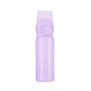 Garrafa de cabelo vazio com pincel aplicador.